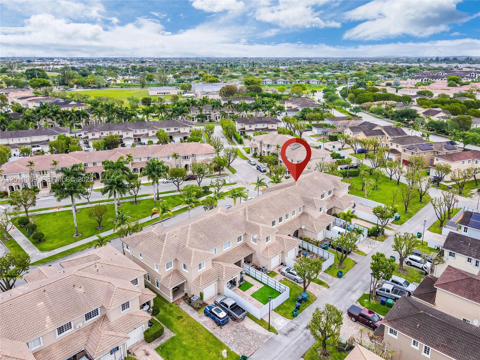14044 Southwest 273rd Lane, Unit 14044 Homestead, FL 33032 - Photo 32 of 44 a view of a city