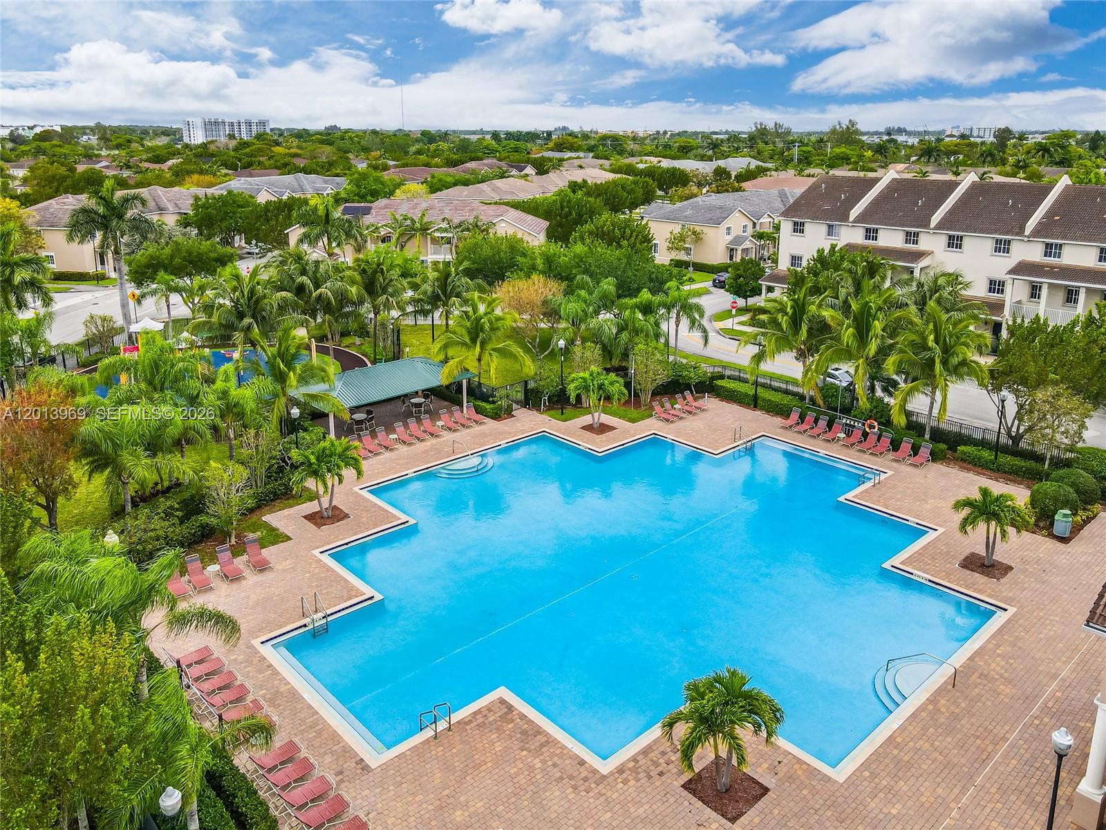 14044 Southwest 273rd Lane, Unit 14044 Homestead, FL 33032 - Photo 43 of 44 an aerial view of residential houses with outdoor space