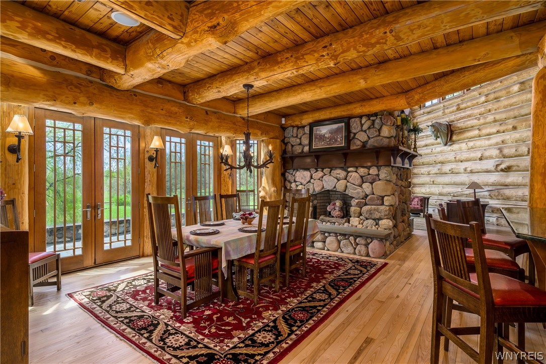 11522 Bixby Hill Road Freedom, NY 14009 - Photo 11 of 50 Dining room with fireplace