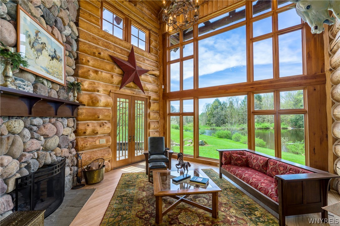 11522 Bixby Hill Road Freedom, NY 14009 - Photo 10 of 50 Two story living room with wood burning firplace