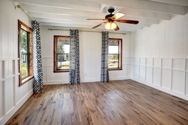 a view of kitchen with furniture and flat screen tv