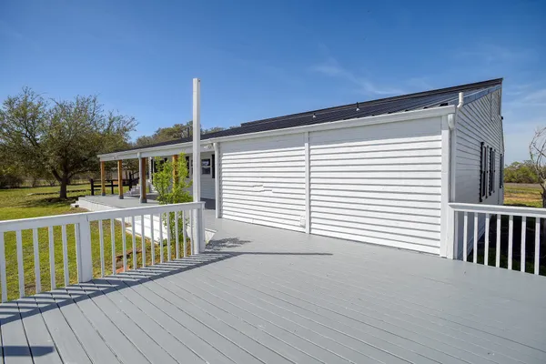 a view of a house with a deck