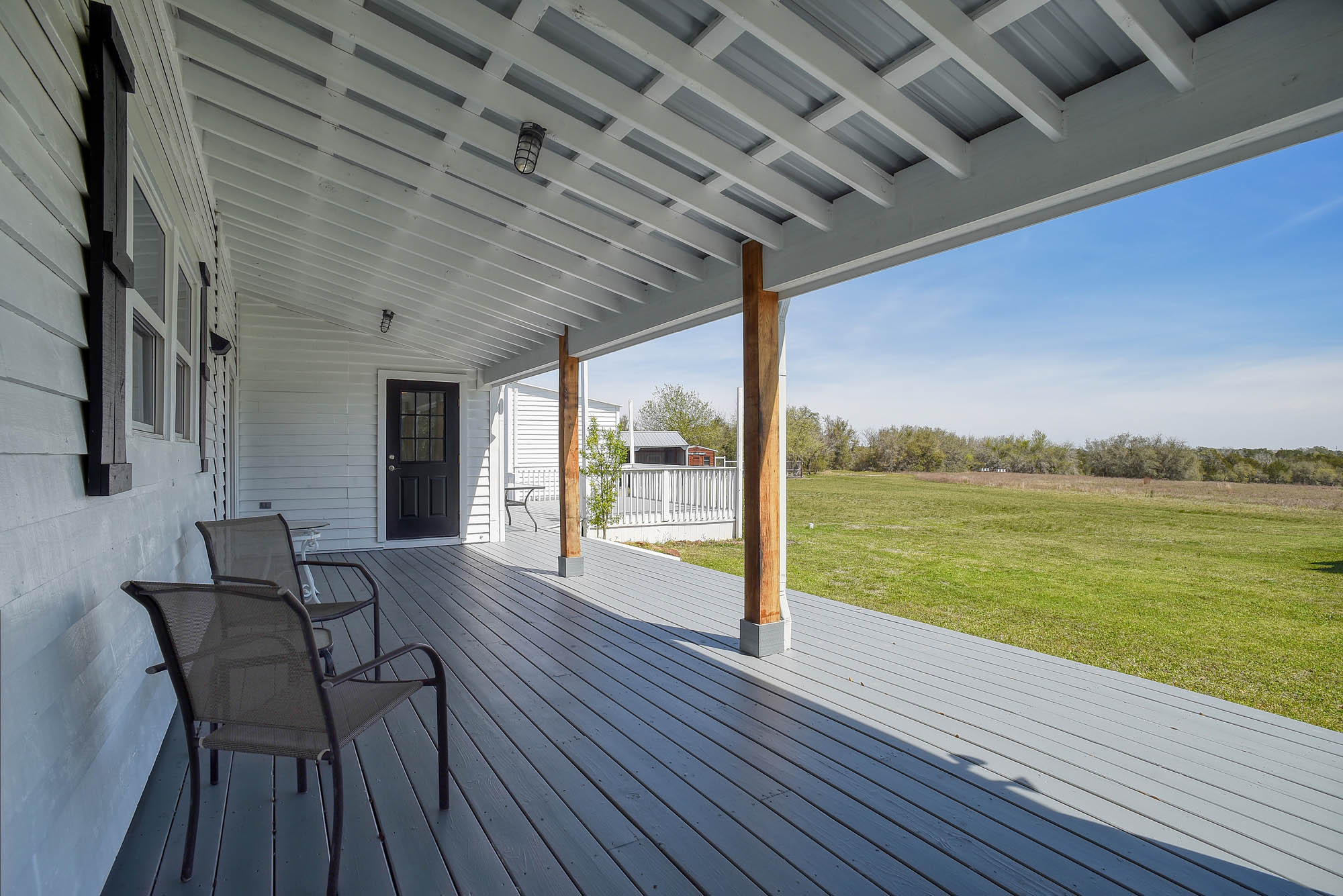 4165 Pin Oak Road Muldoon, TX 78949 - Photo 34 of 43 a view of a balcony with lake view and a table