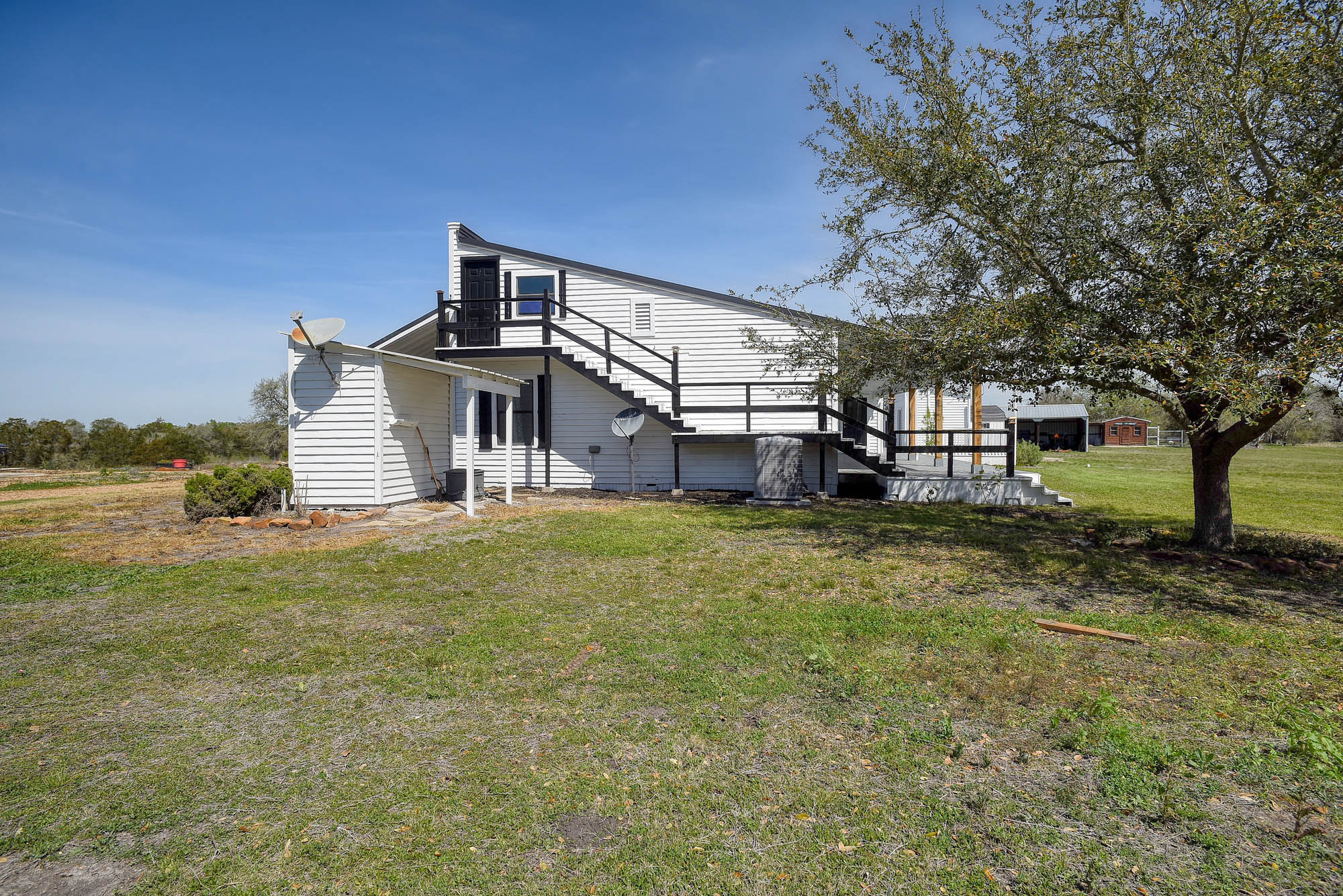 4165 Pin Oak Road Muldoon, TX 78949 - Photo 35 of 43 a front view of a house with a yard