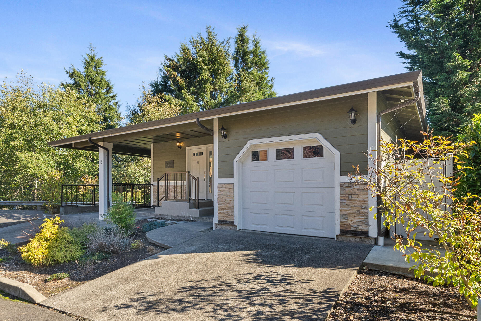 13150 D Street Nehalem, OR 97131 - Photo 27 of 29 a front view of a house with garden