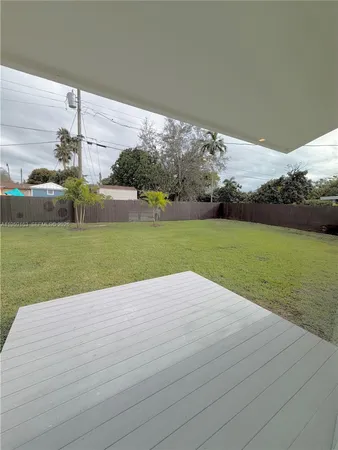 a view of a golf course with a lake