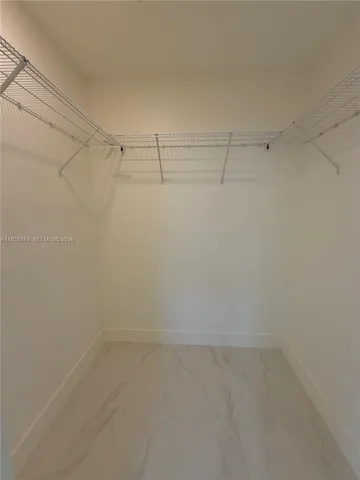 an empty room with a door
