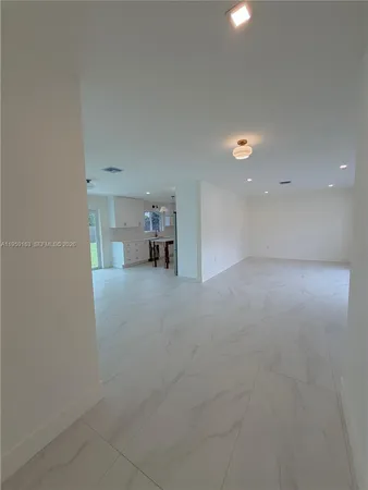 a view of empty room with a window