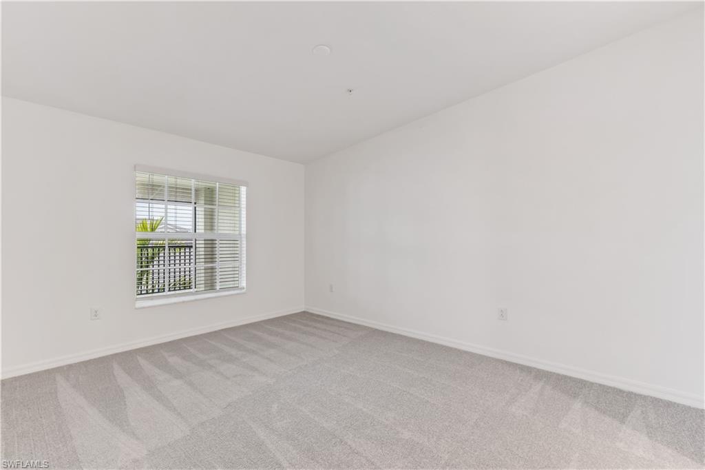 15950 Grassland Lane, Unit 2623 Babcock Ranch, FL 33982 - Photo 2 of 16 an empty room with a window
