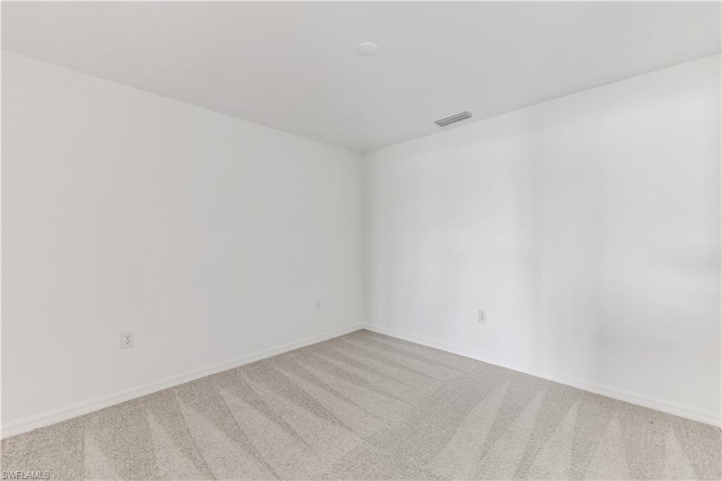 15950 Grassland Lane, Unit 2623 Babcock Ranch, FL 33982 - Photo 10 of 16 a view of an empty room