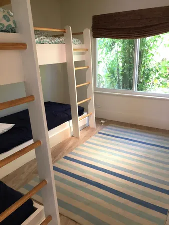 a view of bedroom and front door