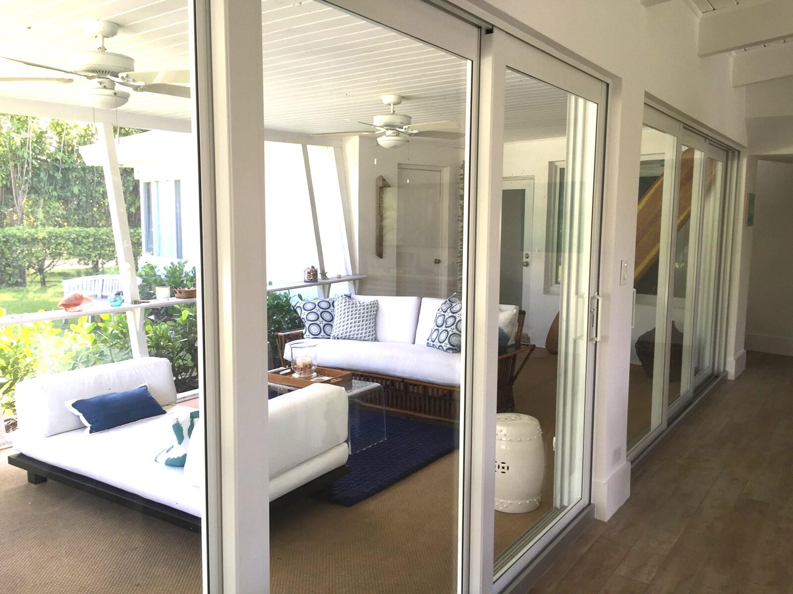 145 Beacon Lane Jupiter Inlet Colony, FL 33469 - Photo 7 of 15 a en suite bathroom with a tub shower and a sink