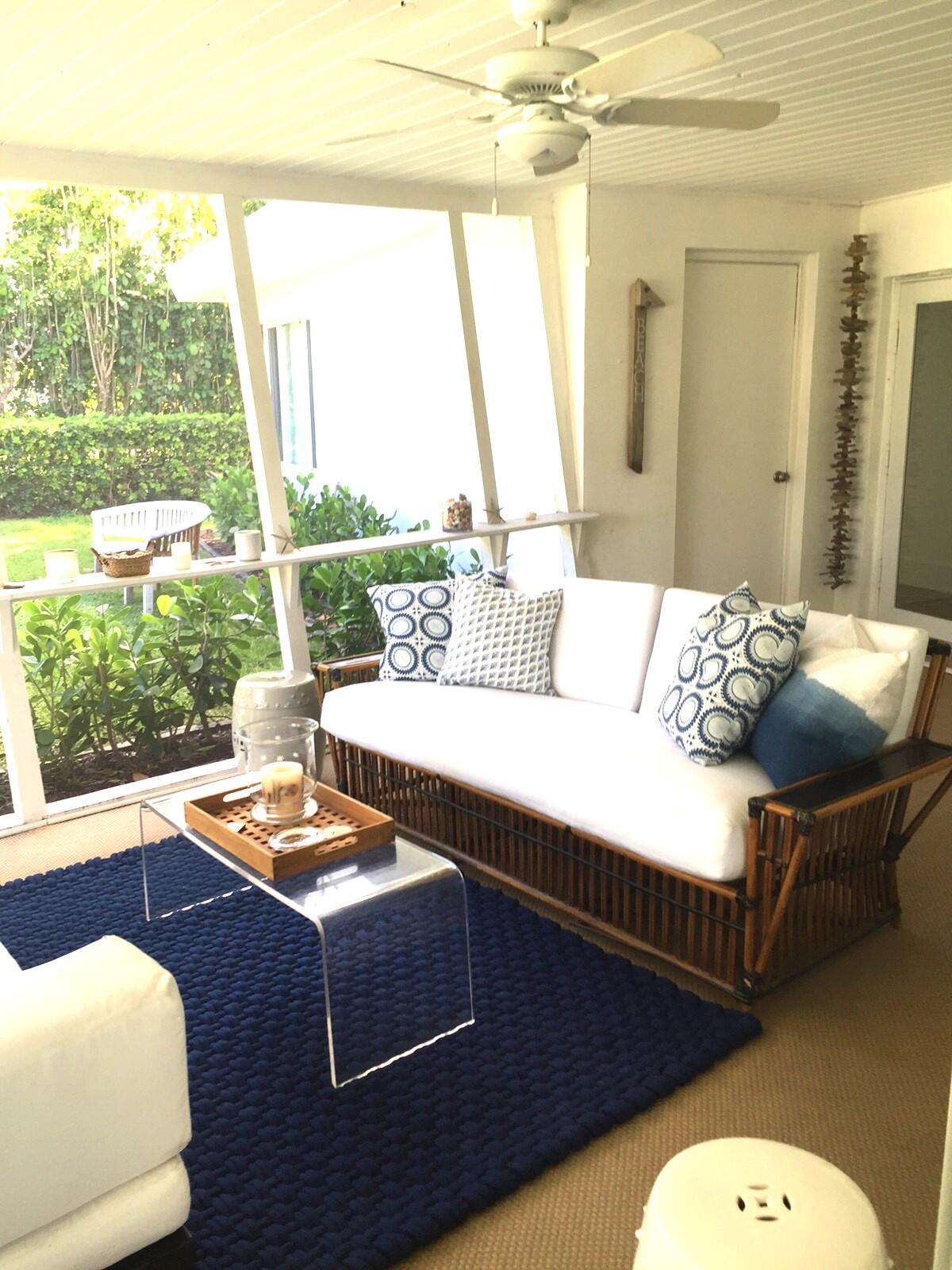 145 Beacon Lane Jupiter Inlet Colony, FL 33469 - Photo 8 of 15 a living room with furniture and a window