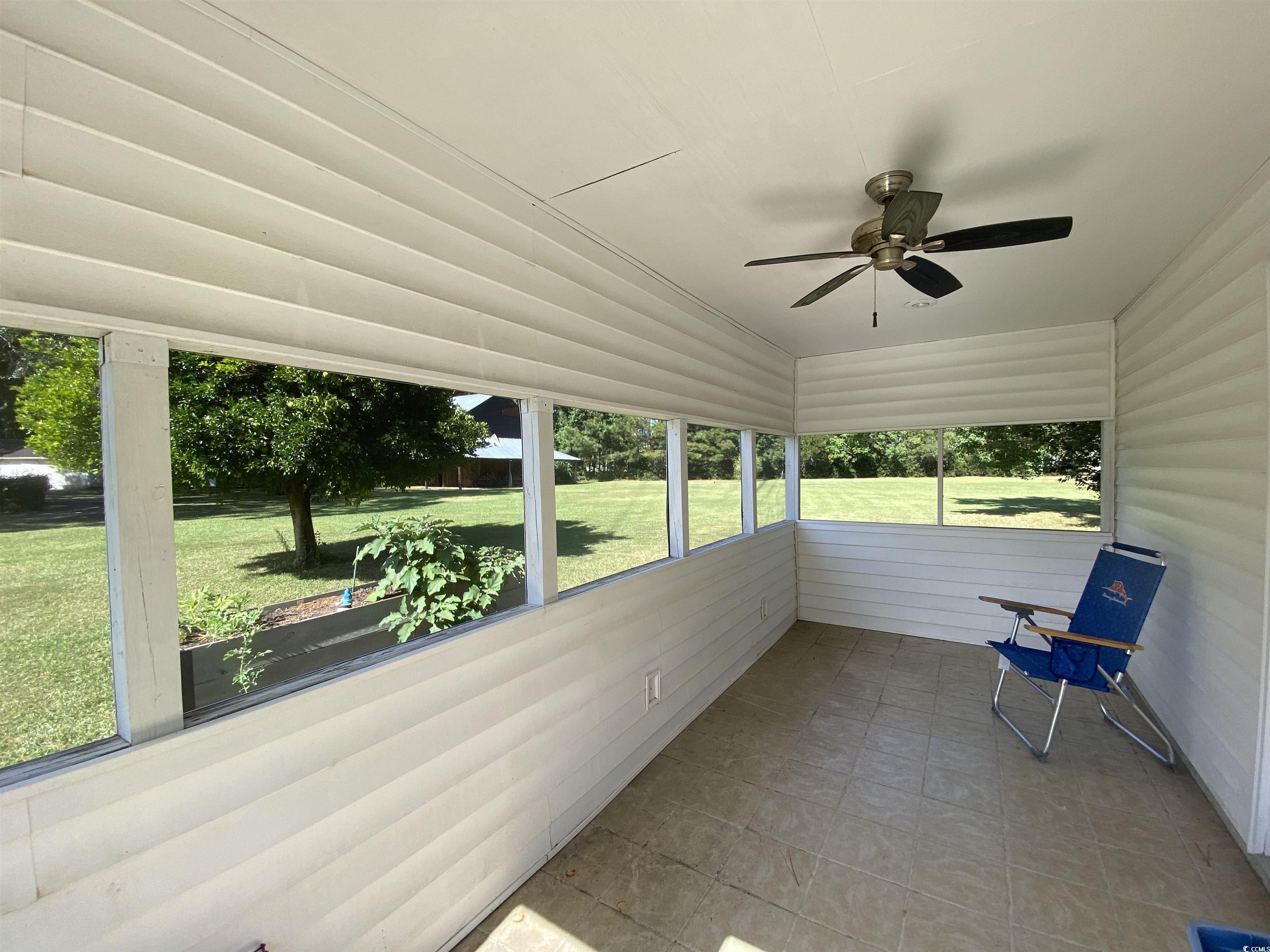 2593 Long Ave Extension Conway, SC 29526 - Photo 11 of 40 Unfurnished sunroom featuring ceiling fan