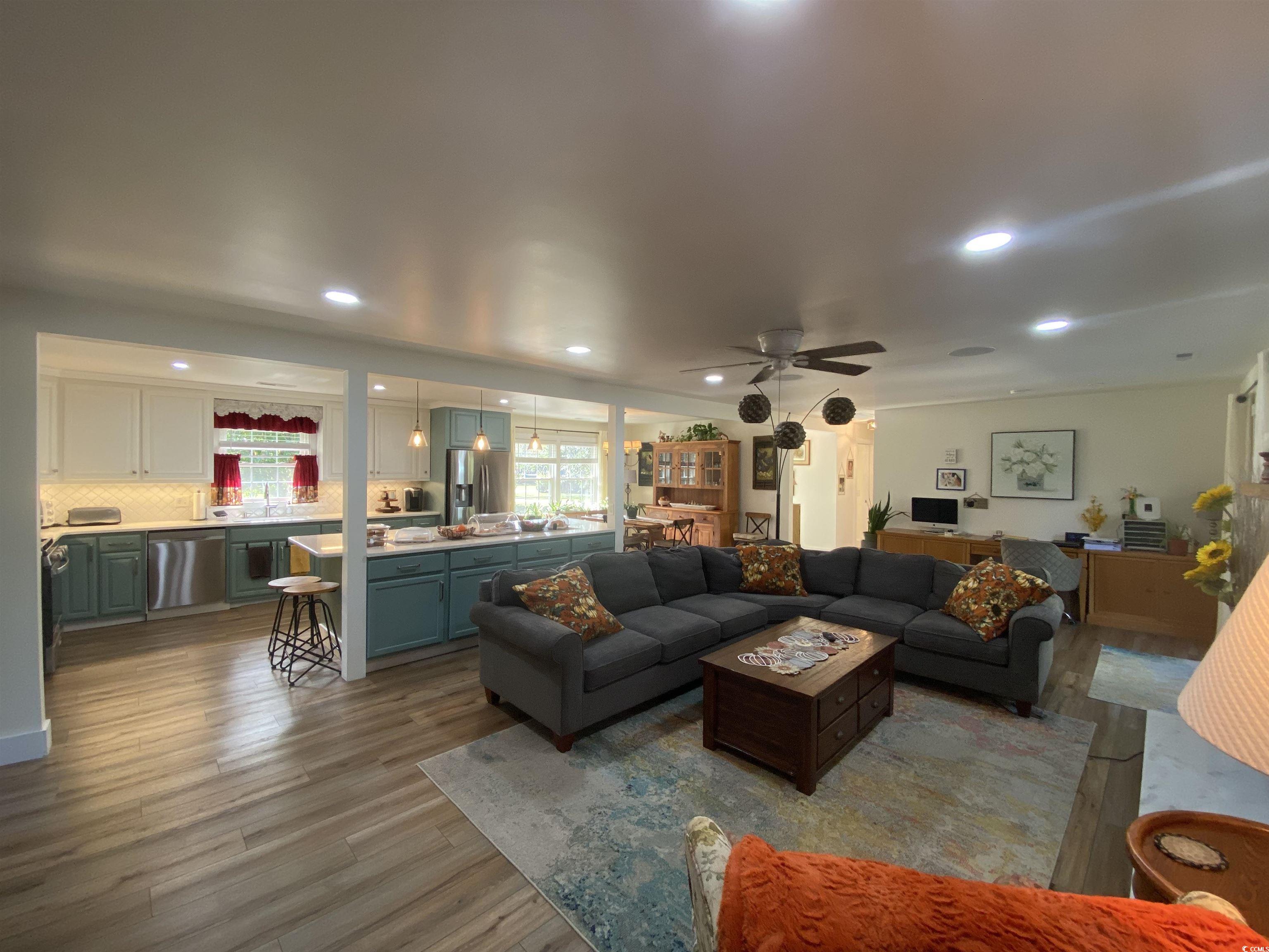 2593 Long Ave Extension Conway, SC 29526 - Photo 23 of 40 Living area with recessed lighting, dark wood-type flooring, and a ceiling fan