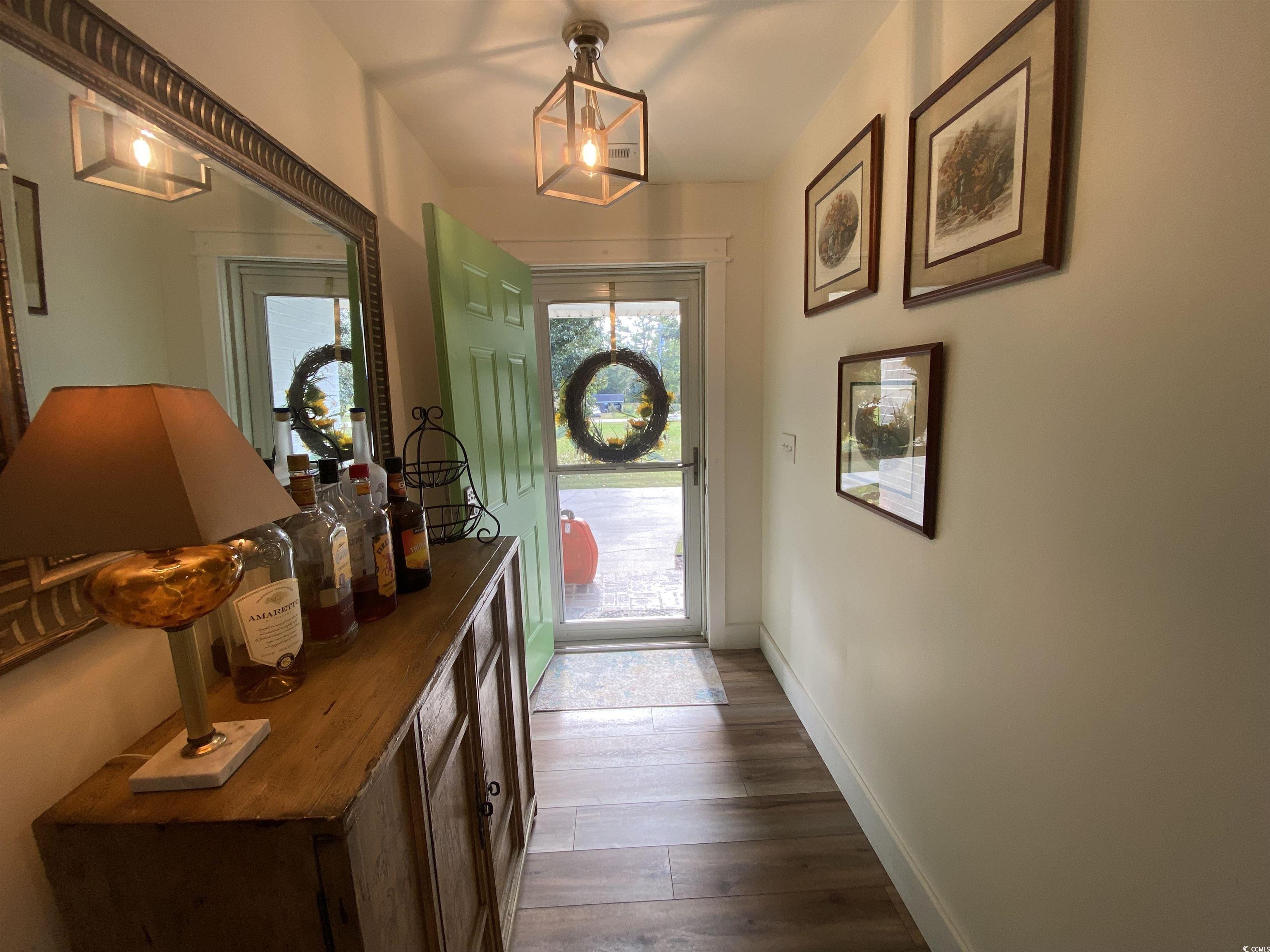 2593 Long Ave Extension Conway, SC 29526 - Photo 30 of 40 Doorway featuring baseboards and wood finished floors