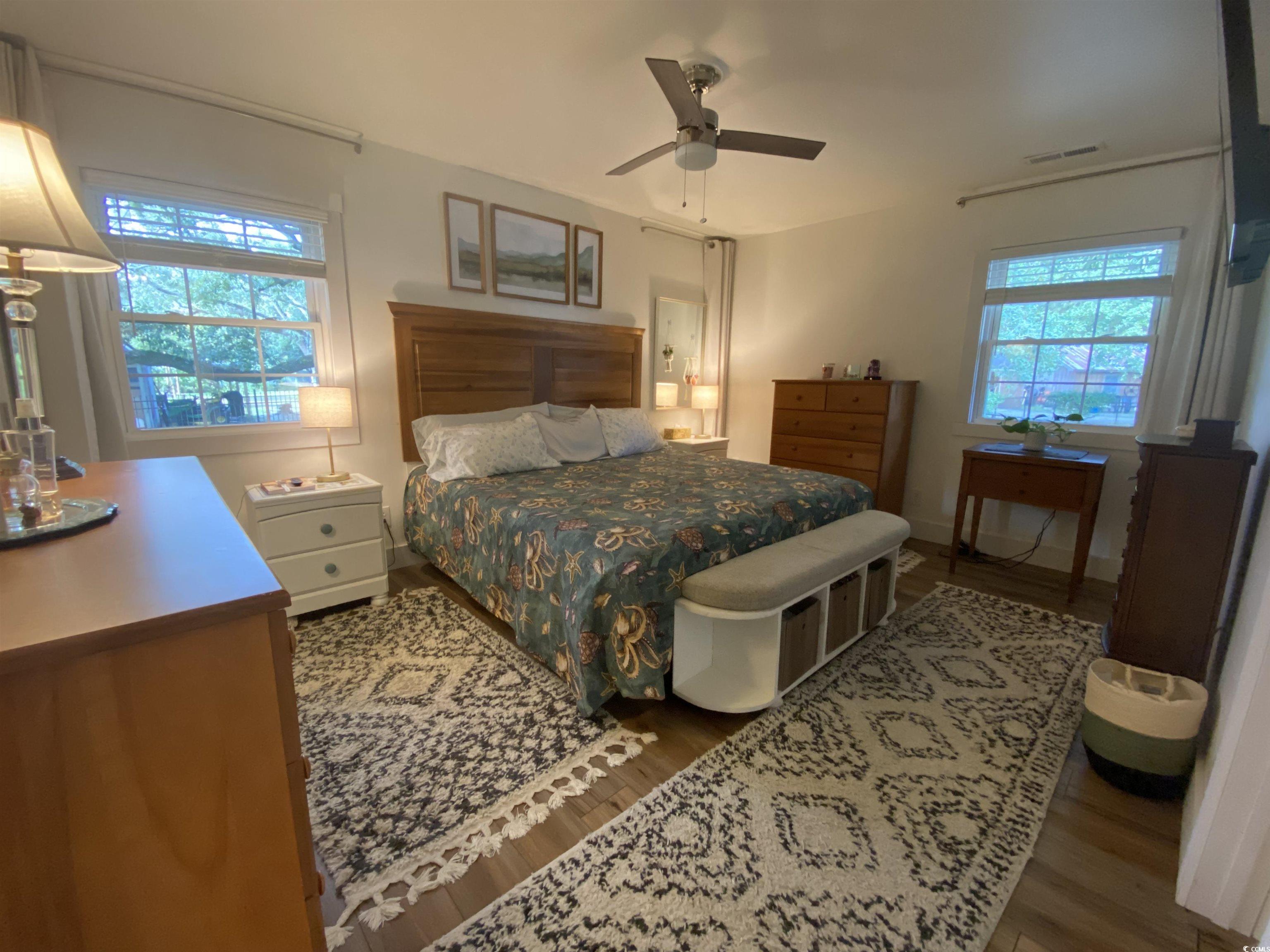 2593 Long Ave Extension Conway, SC 29526 - Photo 31 of 40 Bedroom featuring wood finished floors and a ceiling fan