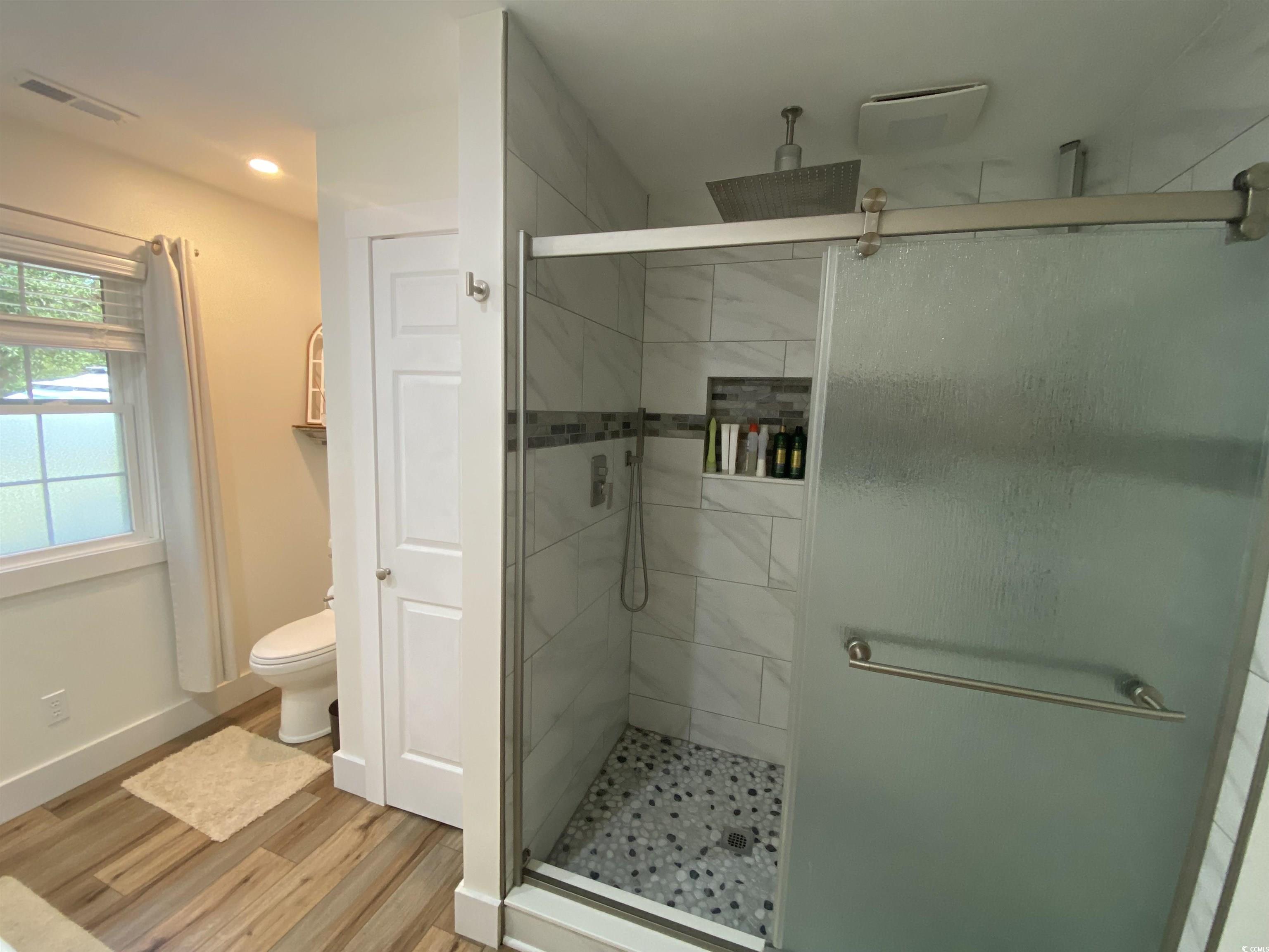 2593 Long Ave Extension Conway, SC 29526 - Photo 34 of 40 Bathroom with a stall shower, light wood-style floors, and recessed lighting