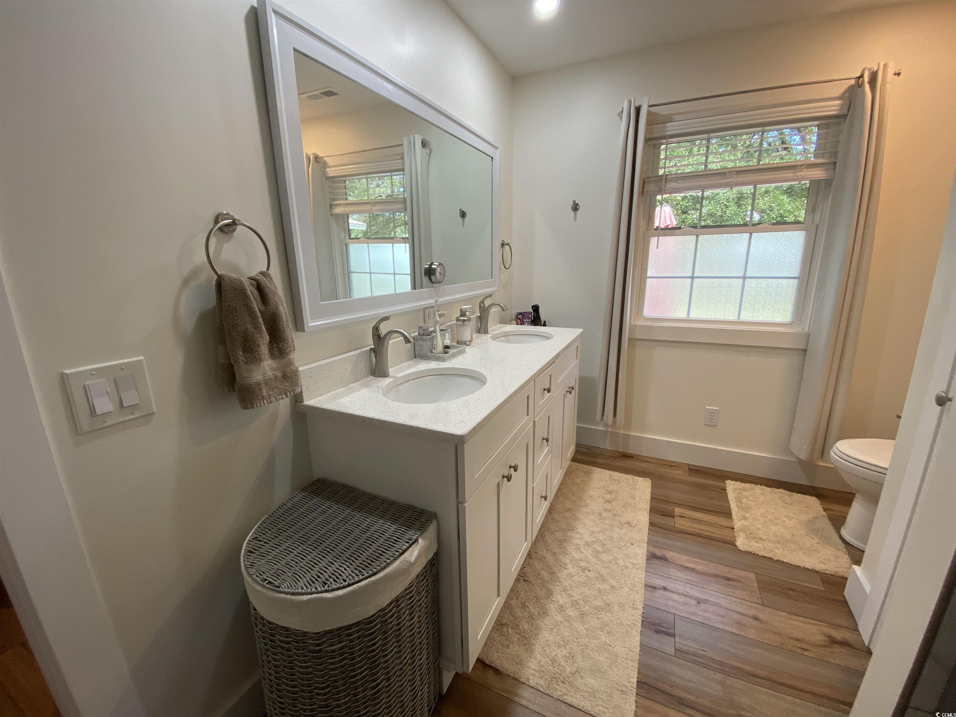 2593 Long Ave Extension Conway, SC 29526 - Photo 35 of 40 Full bathroom with double vanity and dark wood-style flooring