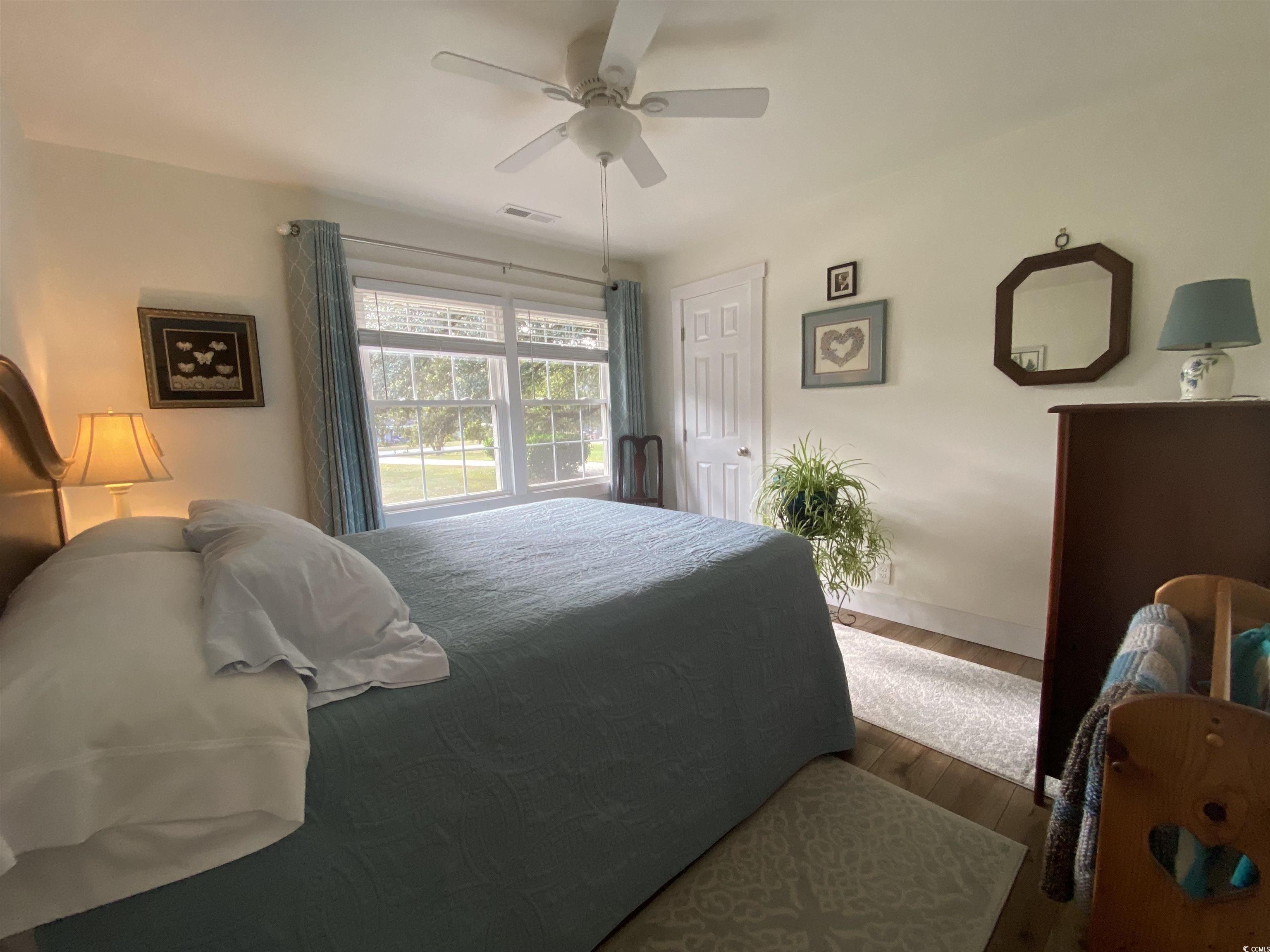 2593 Long Ave Extension Conway, SC 29526 - Photo 36 of 40 Bedroom featuring wood finished floors and a ceiling fan