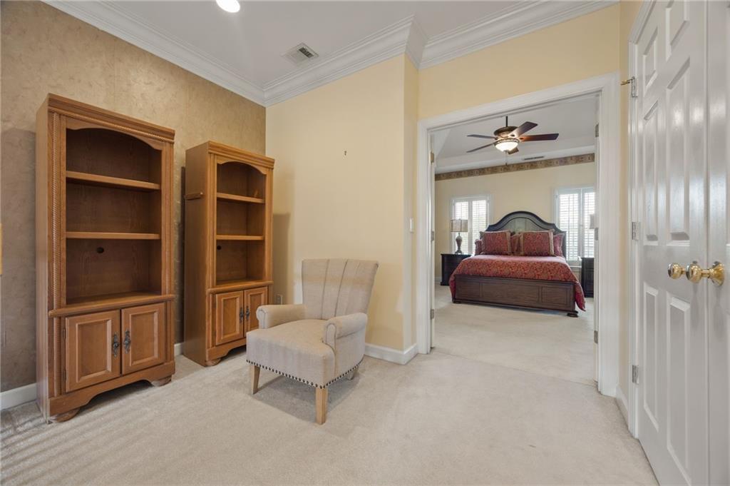4727 Ivy Ridge Drive Southeast Atlanta, GA 30339 - Photo 11 of 35 a living room with furniture and a potted plant