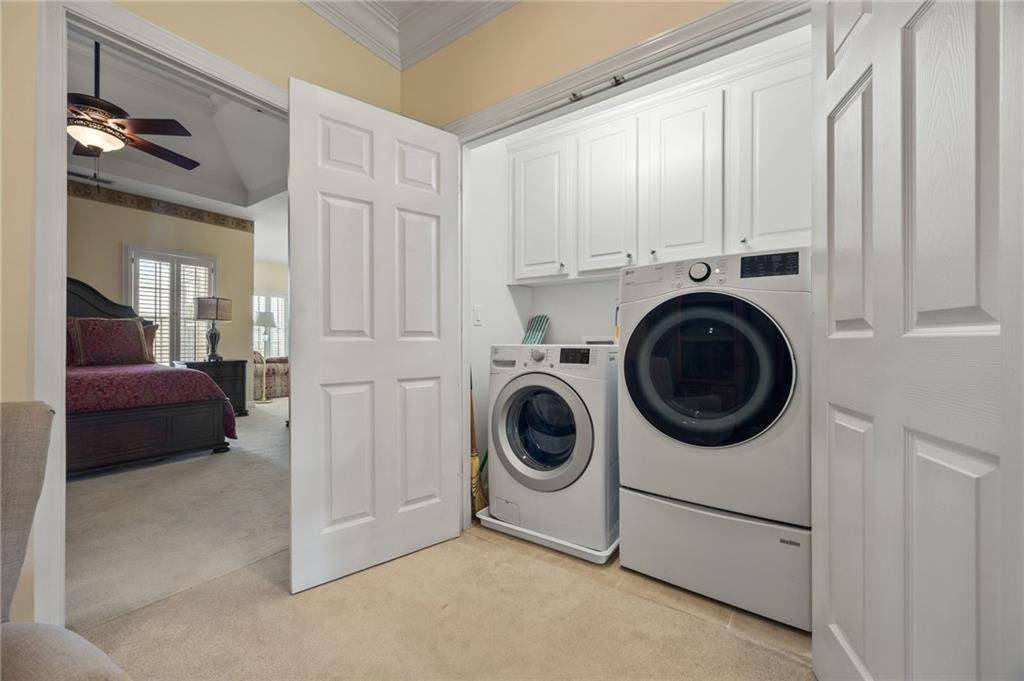 4727 Ivy Ridge Drive Southeast Atlanta, GA 30339 - Photo 24 of 35 a view of a hallway with washer and dryer