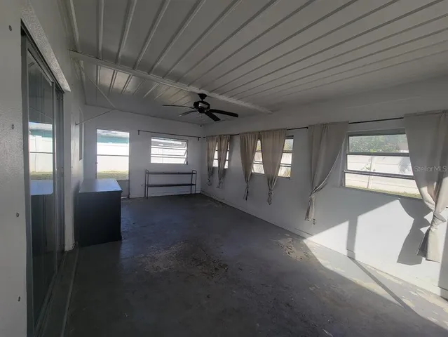 a view of entryway and hall with a window