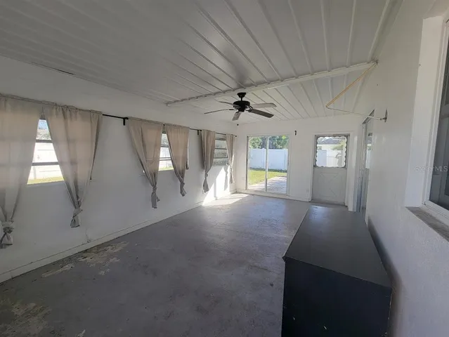 a view of a livingroom with a window