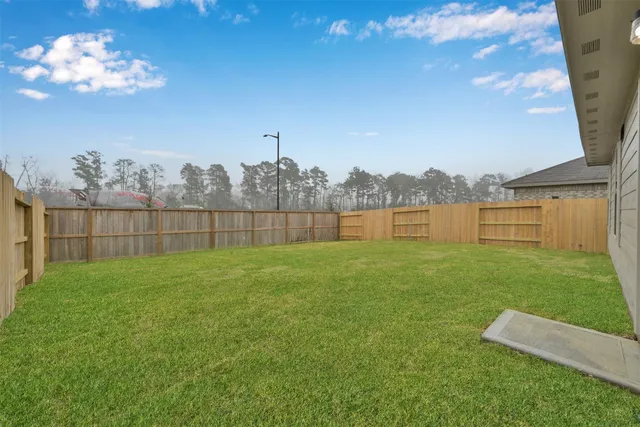 a view of a garden with a lake view