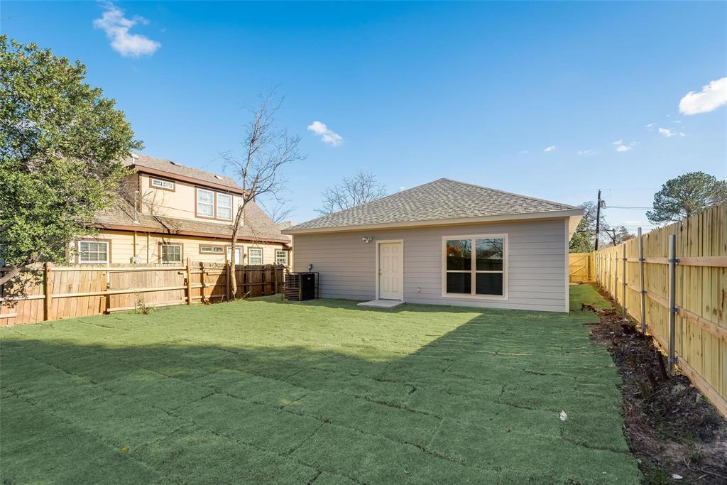 4337 Canal Street Dallas, TX 75210 - Photo 22 of 24 a view of a yard in front of a house with a small yard