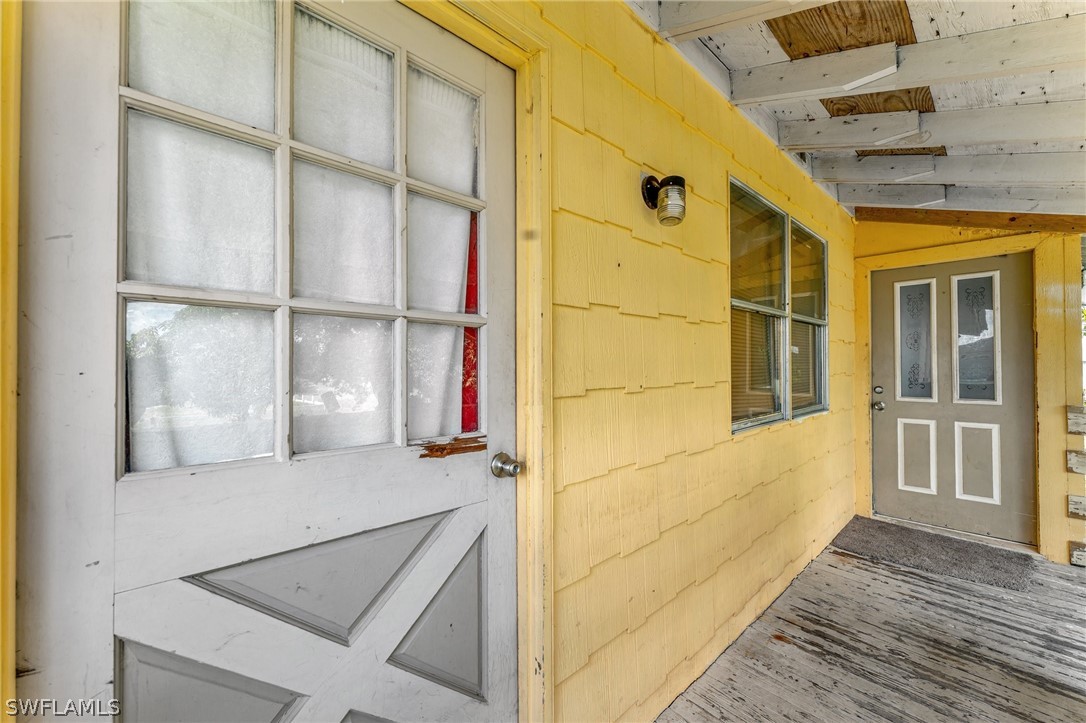 3809 4th Street Southwest Lehigh Acres, FL 33976 - Photo 12 of 34 a view of front door of house