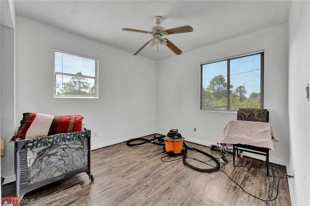 3809 4th Street Southwest Lehigh Acres, FL 33976 - Photo 29 of 34 a workspace with furniture and window
