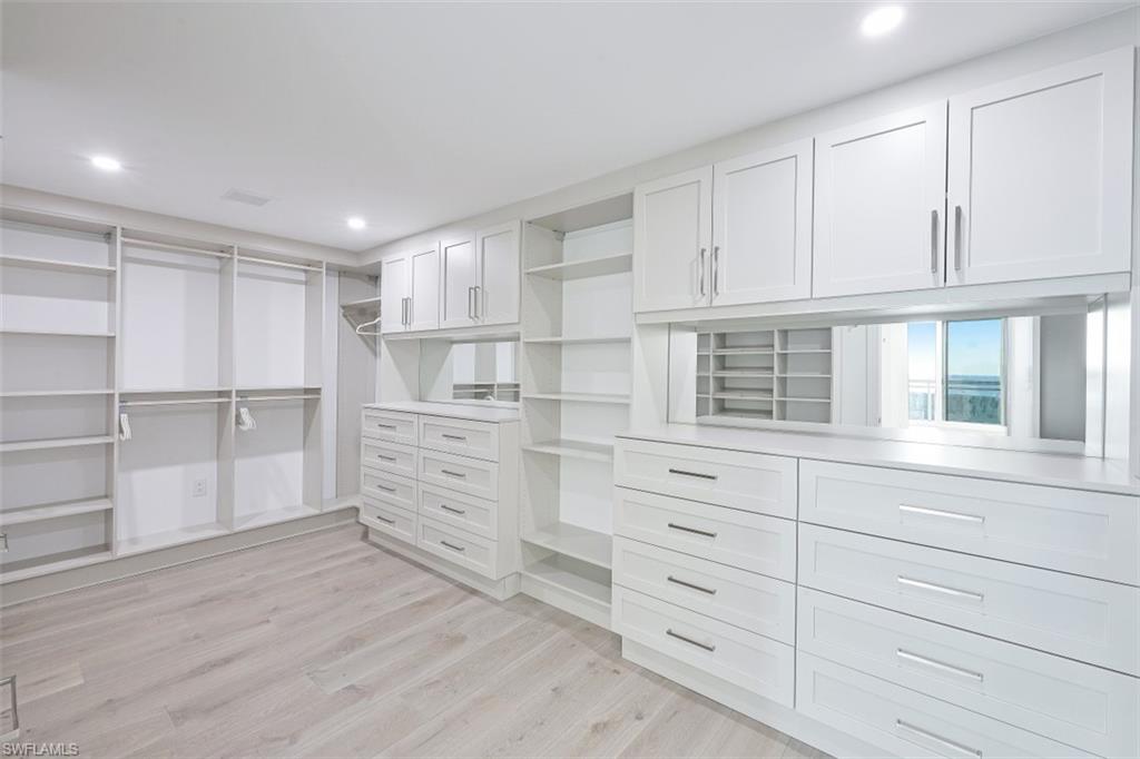 13935 Old Coast Road, Unit 1703 Naples, FL 34110 - Photo 14 of 44 a view of cabinets and window