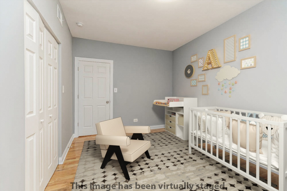 1411 East 67th Place, Unit 2W Chicago, IL 60637 - Photo 11 of 14 a bathroom with a sink and a mirror