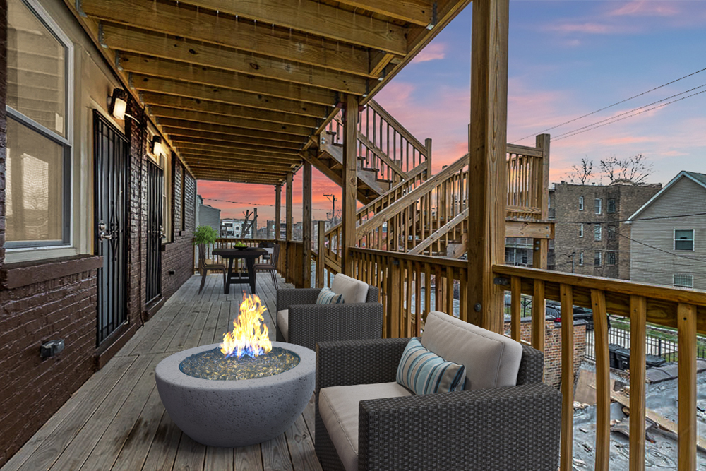 1411 East 67th Place, Unit 2W Chicago, IL 60637 - Photo 13 of 14 a balcony with table and chairs