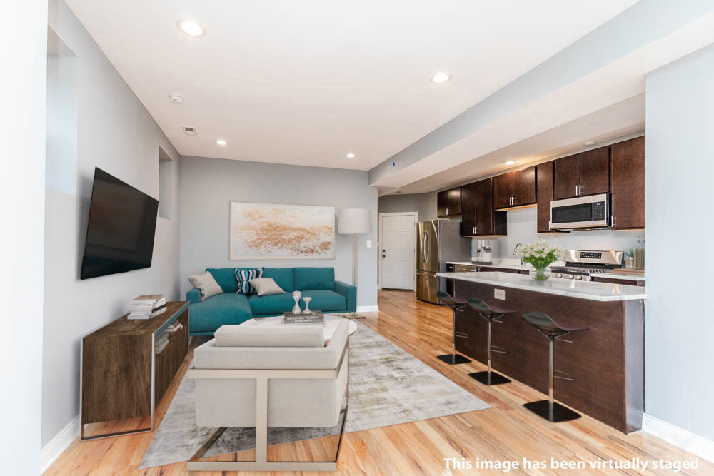 1411 East 67th Place, Unit 2W Chicago, IL 60637 - Photo 3 of 14 a living room with furniture and a flat screen tv