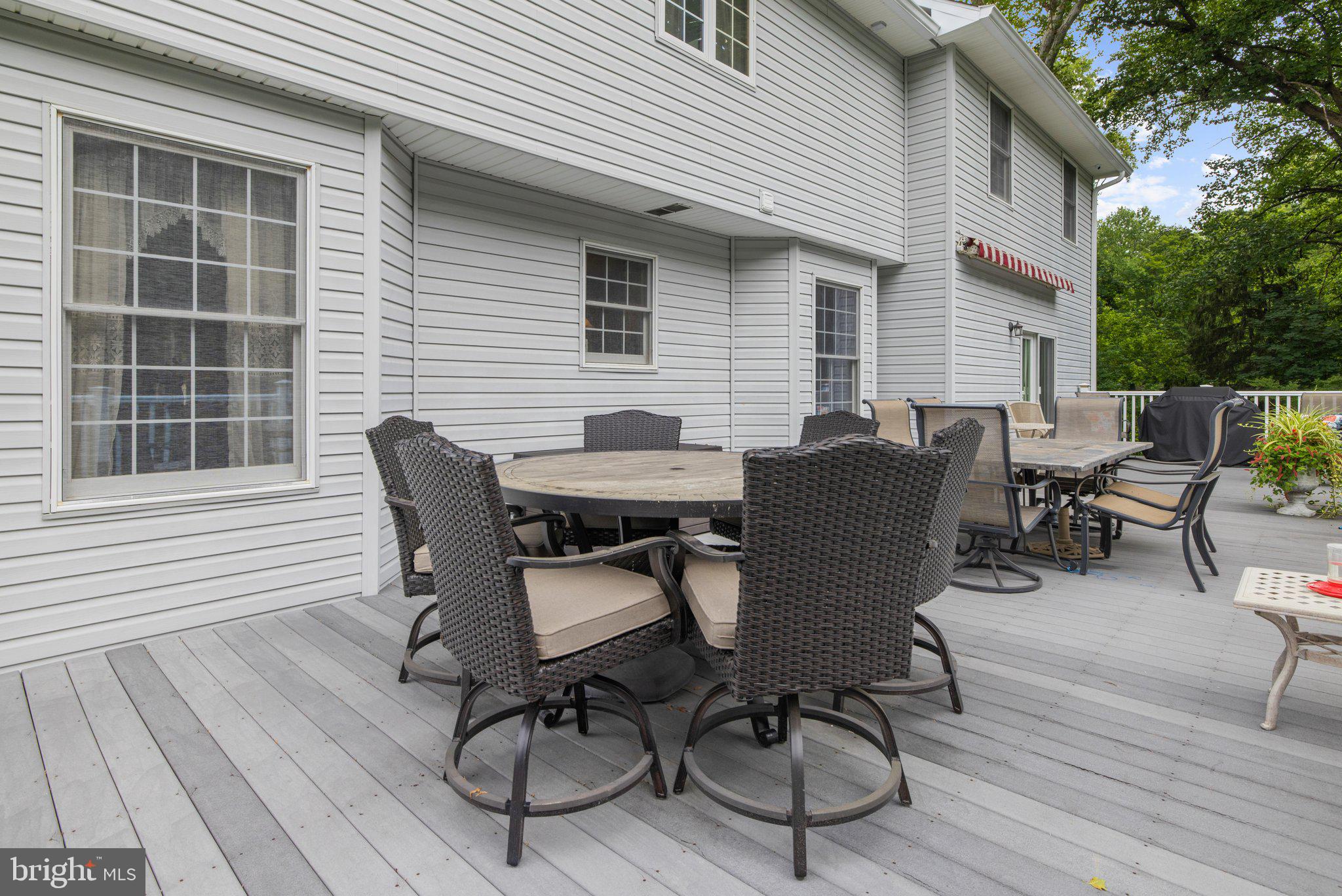 63 Church Road Arnold, MD 21012 - Photo 48 of 58 Retractable awning for shade when you need it