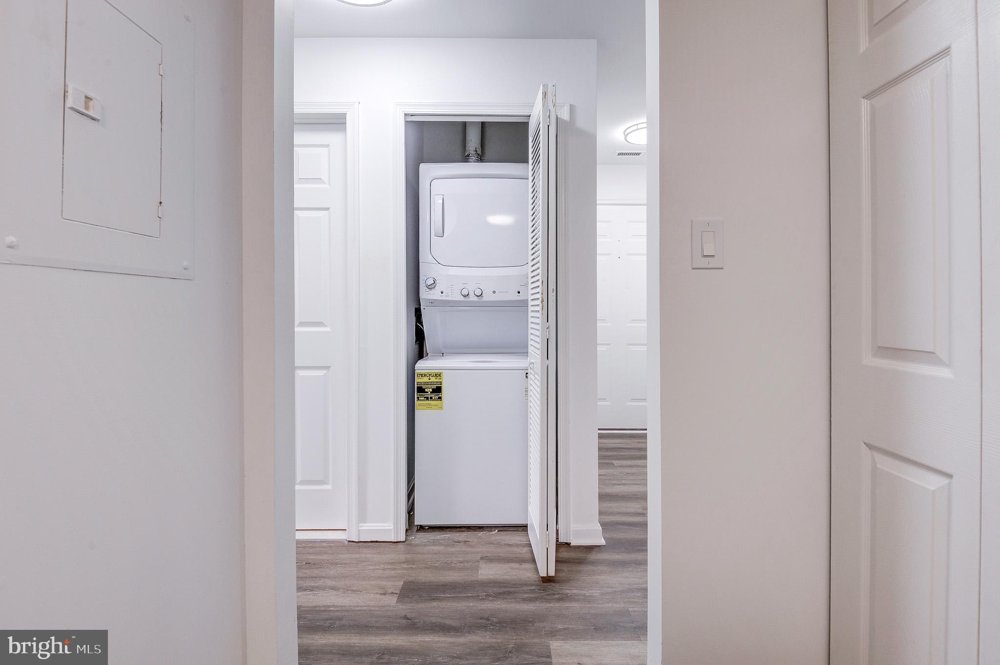 20600 Cornstalk Terrace, Unit 202 Ashburn, VA 20147 - Photo 16 of 31 a view of an entryway with wooden floor