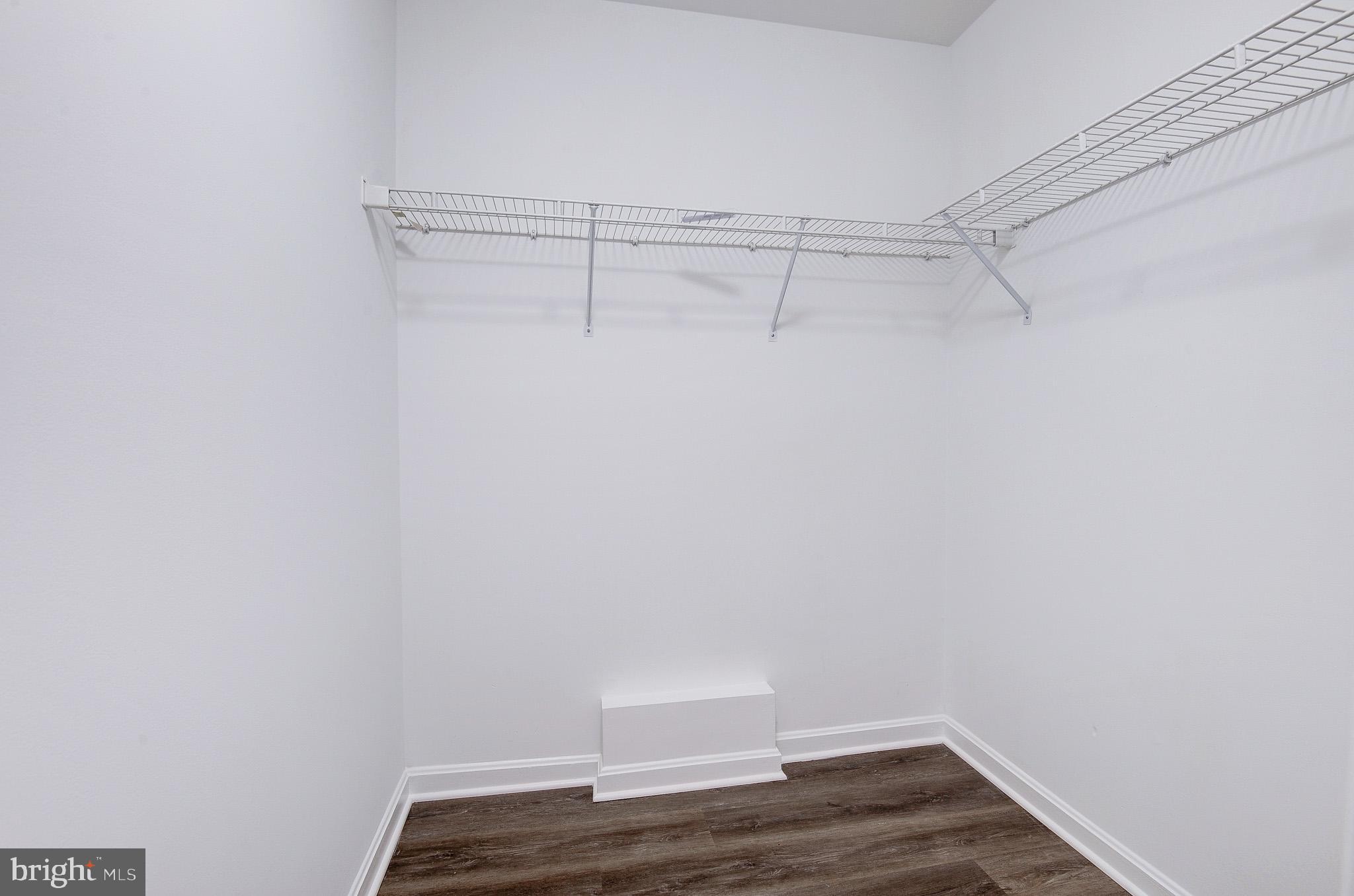20600 Cornstalk Terrace, Unit 202 Ashburn, VA 20147 - Photo 19 of 31 a view of small space with racks on the wall