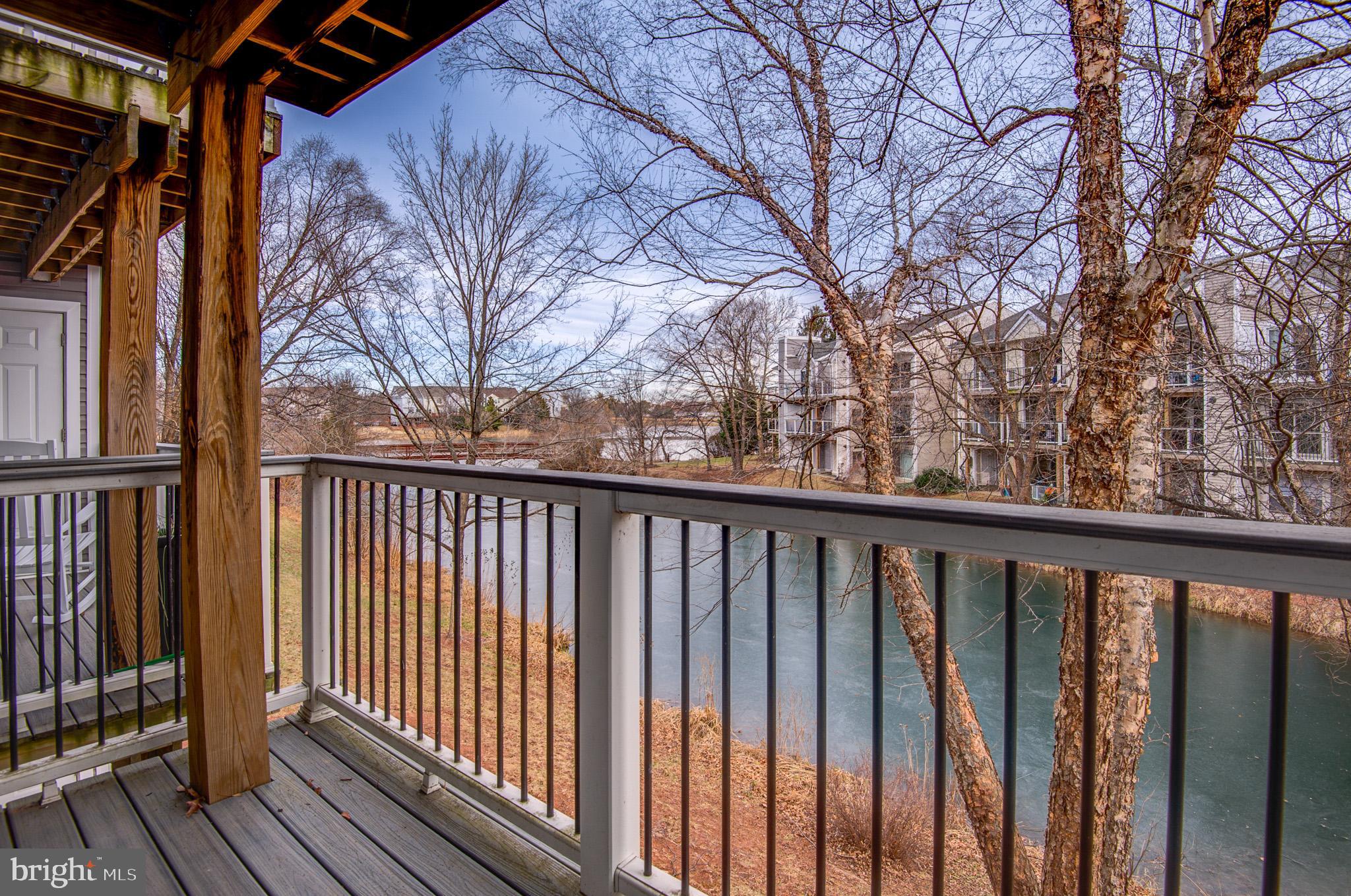 20600 Cornstalk Terrace, Unit 202 Ashburn, VA 20147 - Photo 6 of 31 a view of a wooden deck