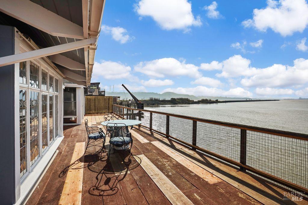 34 Sandy Beach Road Vallejo, CA 94590 - Photo 11 of 63 a view of balcony with wooden floor and seating