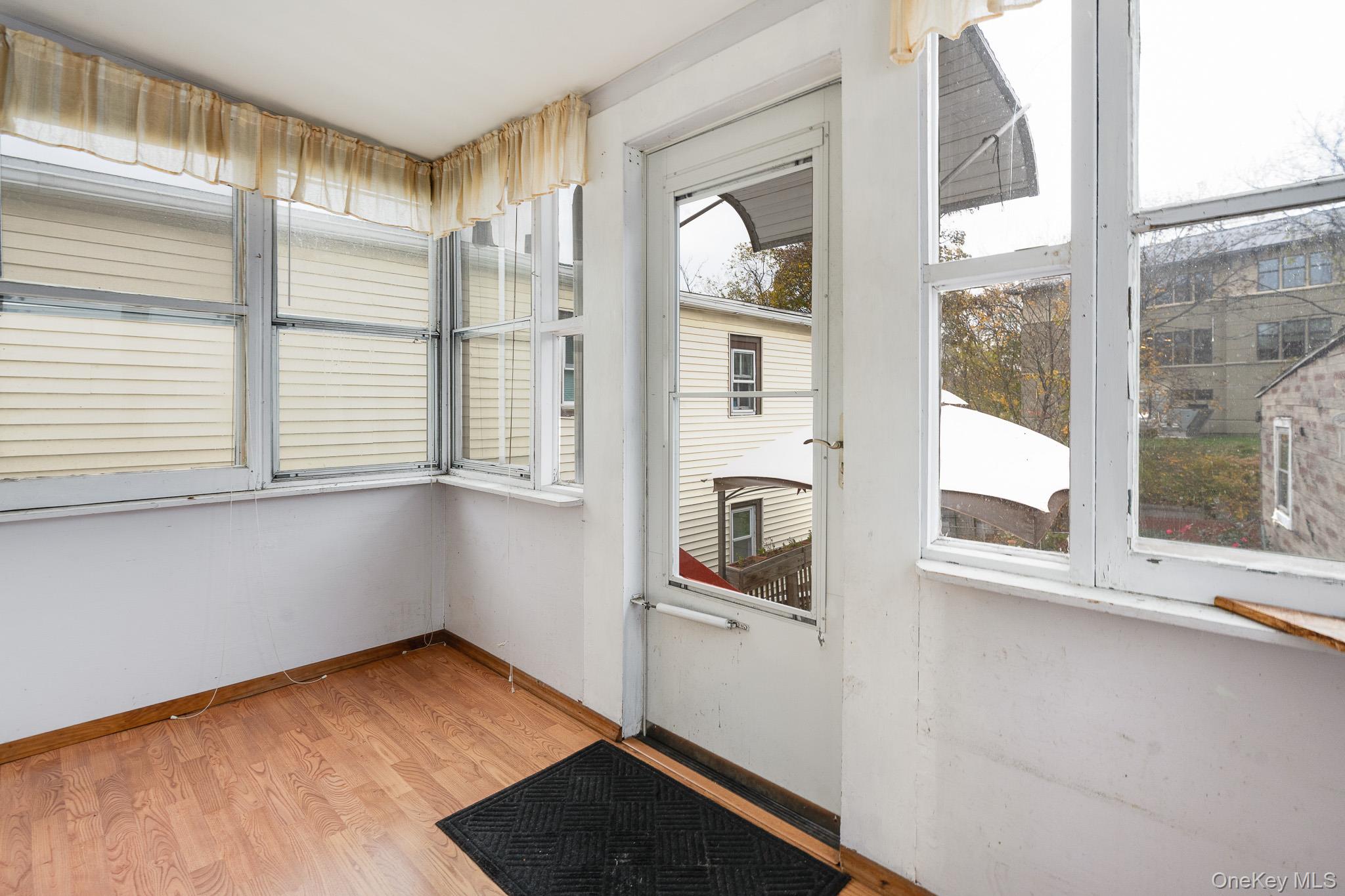 36 Spruce Street Poughkeepsie, NY 12601 - Photo 19 of 30 a view of a living room with a large window