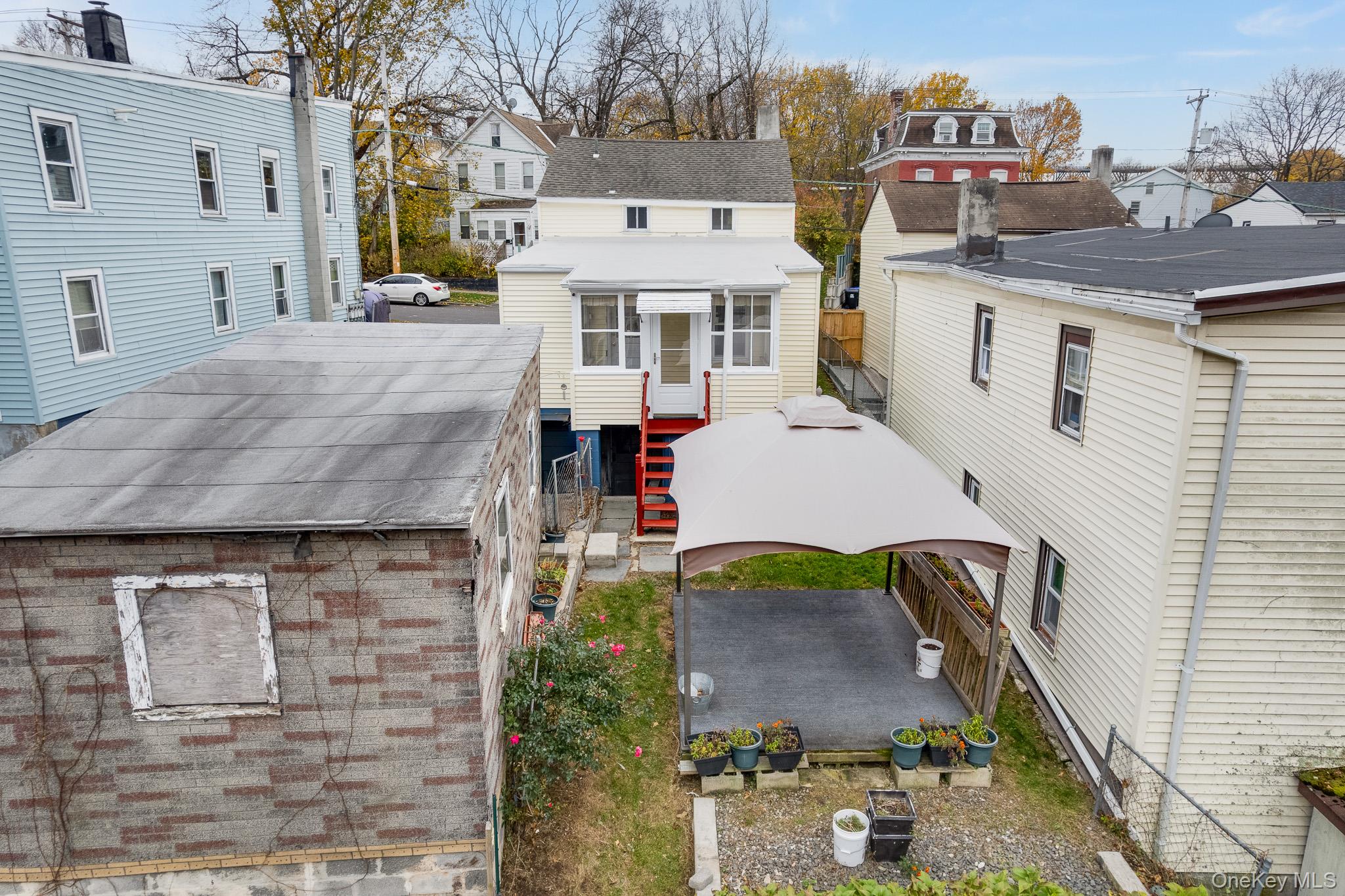 36 Spruce Street Poughkeepsie, NY 12601 - Photo 24 of 30 a aerial view of a house with swimming pool and sitting area