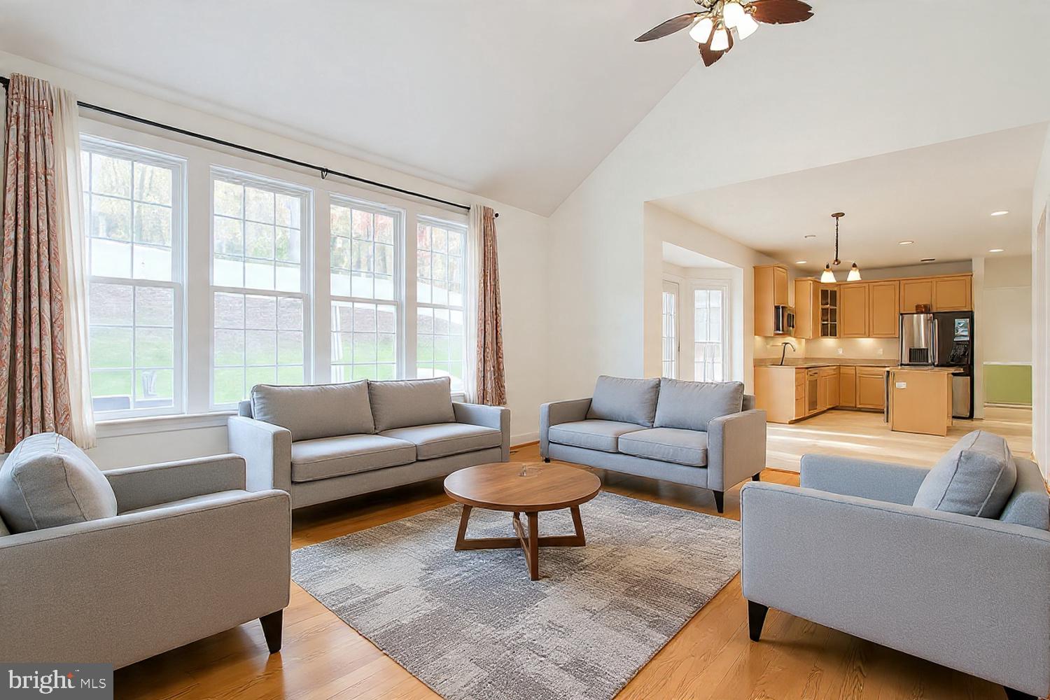 3403 Logstone Drive Triangle, VA 22172 - Photo 12 of 66 a living room with furniture and a large window