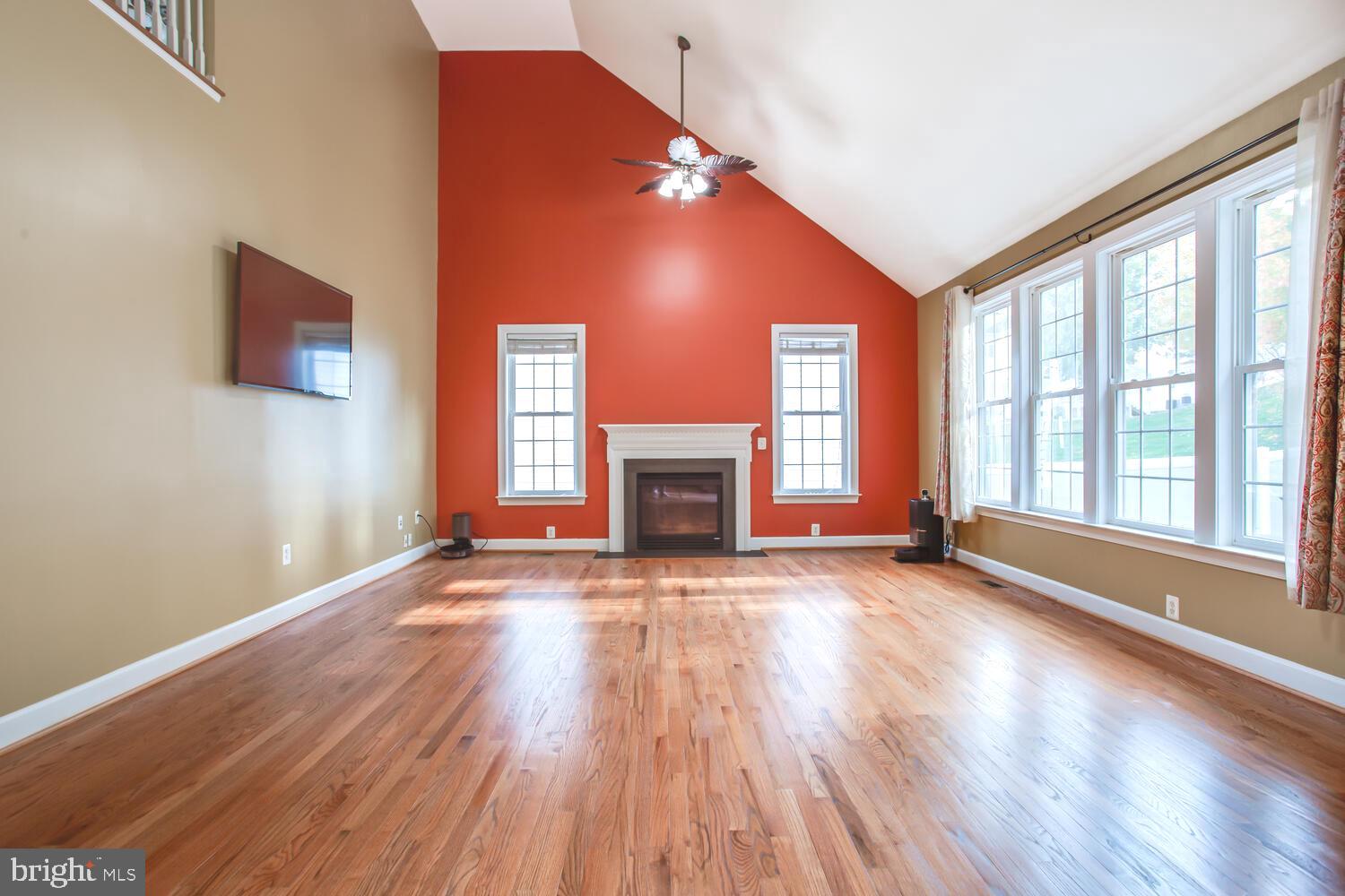 3403 Logstone Drive Triangle, VA 22172 - Photo 18 of 66 a view of an empty room with wooden floor and a window
