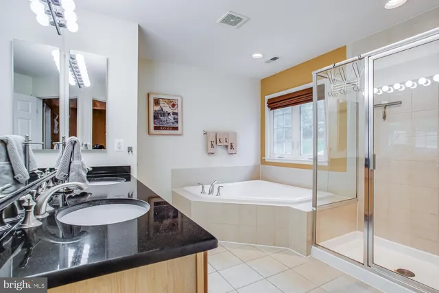 a view of staircase with furniture and a window