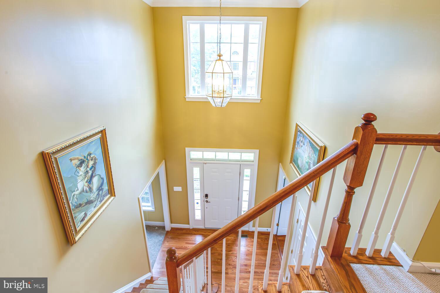 3403 Logstone Drive Triangle, VA 22172 - Photo 43 of 66 a view of staircase with furniture and a window
