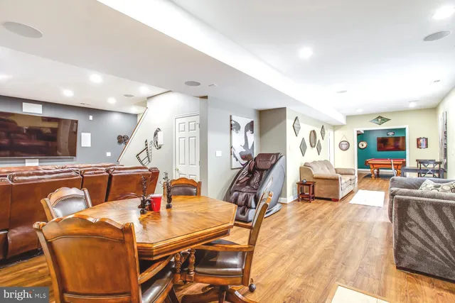 a view of a patio with a table and chairs