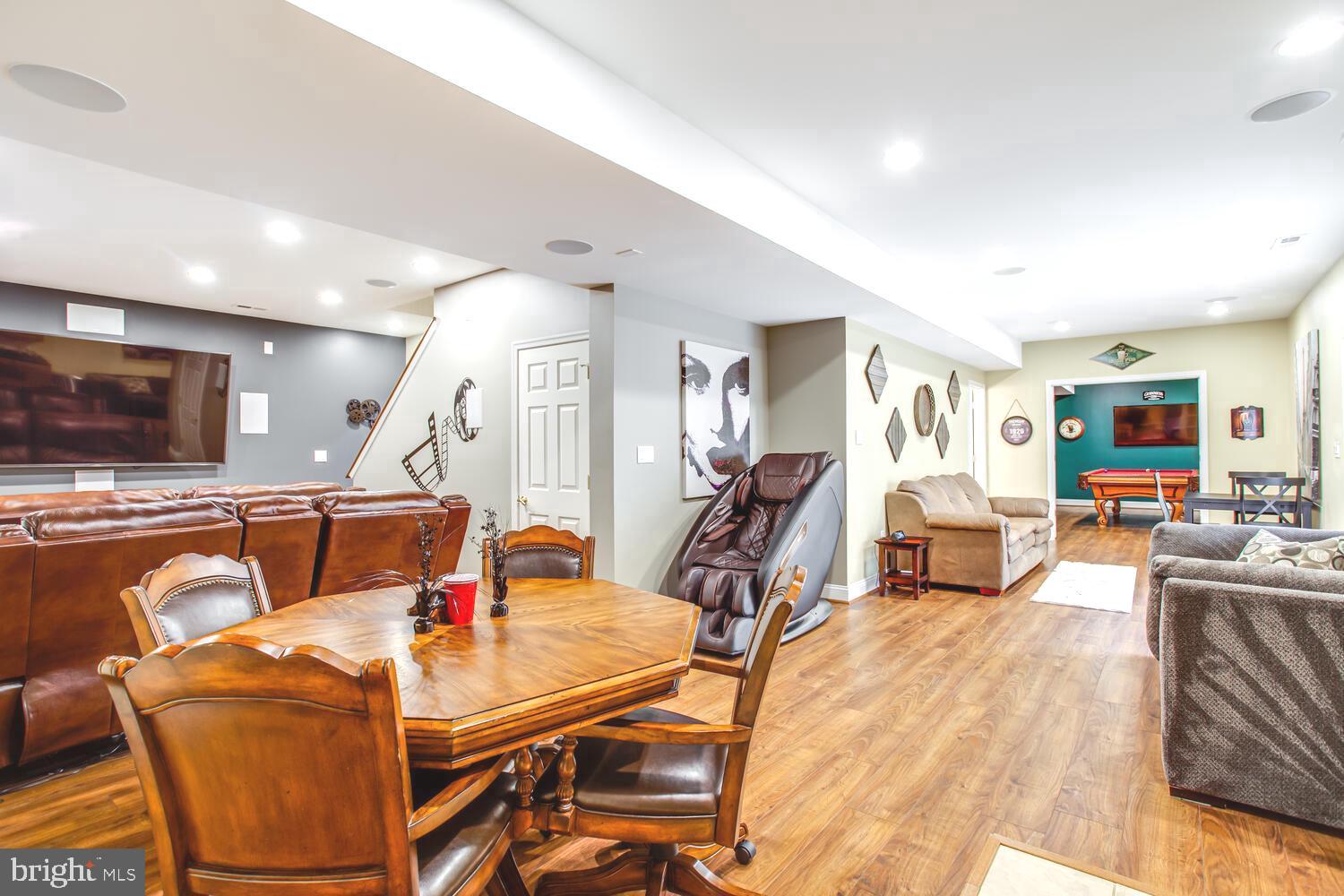 3403 Logstone Drive Triangle, VA 22172 - Photo 49 of 66 a living room with furniture and a flat screen tv