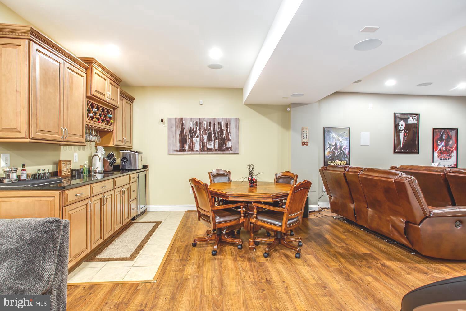3403 Logstone Drive Triangle, VA 22172 - Photo 50 of 66 a living room with furniture and a kitchen view